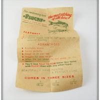 Plucky Black & Red Fish In Tube With Paper