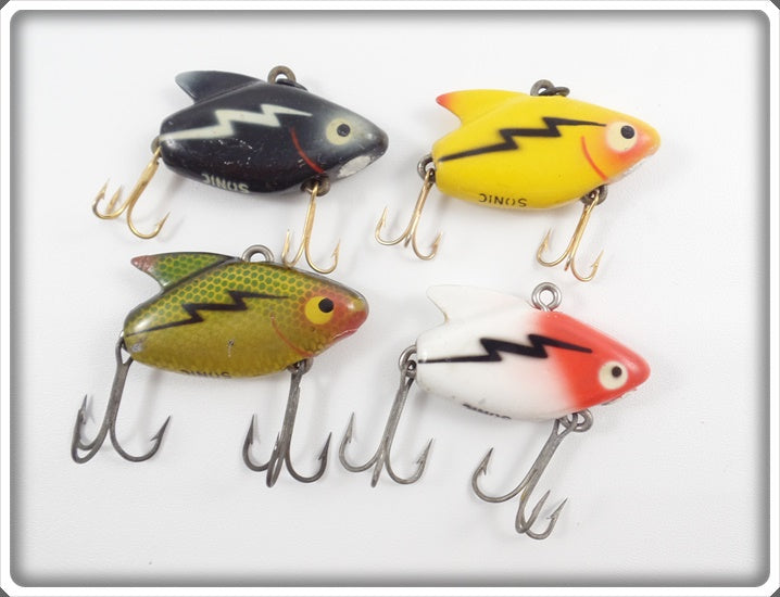 Heddon Sonic Lot Of Four: Yellow, Black, Perch, & Red/White